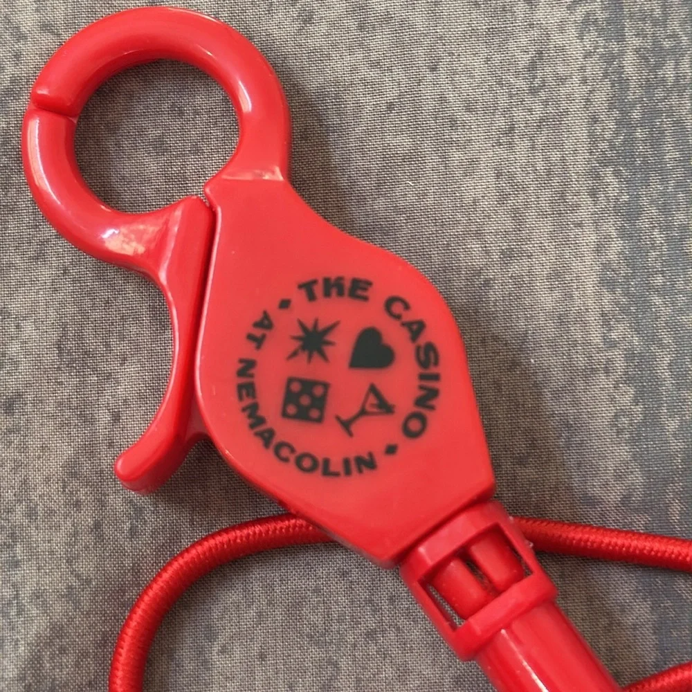 The Casino At Nemacolin lucky player’s card cord. Never used. Red.